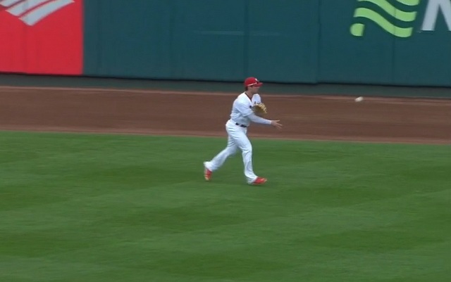 Randal Grichuk had to flip the ball to Jason Heyward because he's couldn't throw.