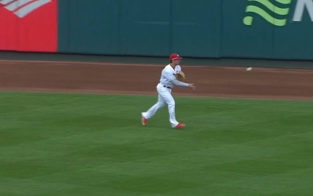 Randal Grichuk had to flip the ball to Jason Heyward because he's couldn't throw.