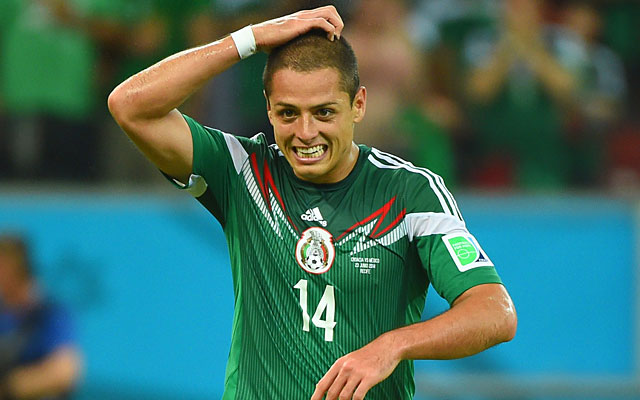 Javier Hernandez is all smiles after scoring Mexico's third goal against Croatia. (Getty)