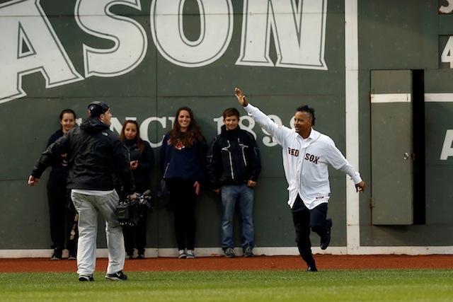 Red Sox on X: A special moment for Manny! OTD in 2004, Manny Ramirez led  his teammates out of the dugout waving a small American flag on his first  full day of