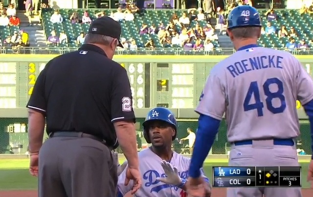 Jimmy Rollins hot a mock staredown with Joe West on Friday.