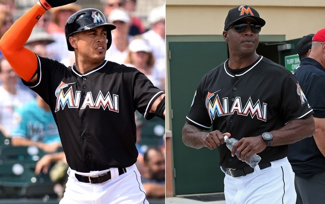 Giancarlo Stanton (l.) and new hitting coach Barry Bonds are the faces of the Marlins.