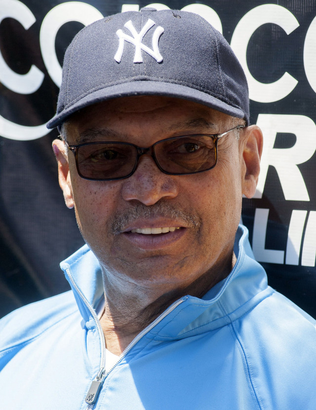 Retired New York Yankee player Reggie Jackson grabs his cap when he is  introduced at the 68th Annual Old-Timers' Day before the New York Yankees  play the Baltimore Orioles at Yankee Stadium