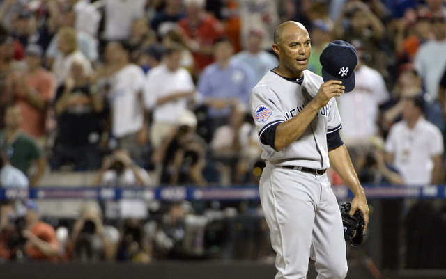 New York Yankees American League All-Star pitcher Mariano Rivera holds the MVP  Trophy after the 84th MLB All-Star Game at Citi Field in New York City on  July 16, 2013. The American