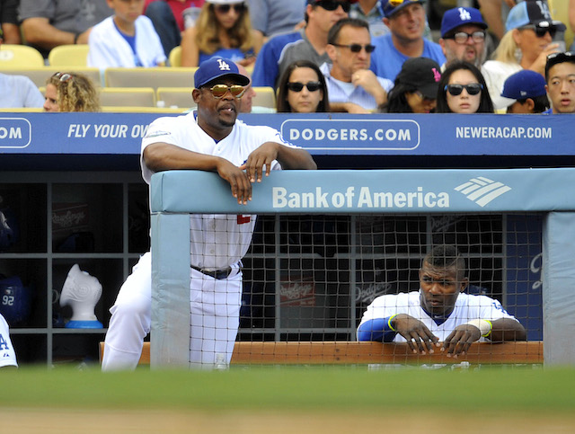 Bench coach, Hanley Ramirez and manager, Juan Uribe