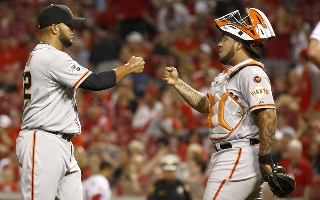 Yusmeiro Petit (l.) and Hector Sanchez were both non-tendered by the Giants Wednesday.