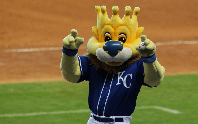 Kansas City Royals mascot Sluggerrr kicks up his heals while