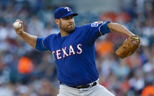 Colby Lewis is back with the Rangers on a one-year contract.
