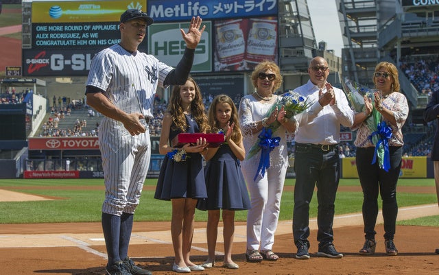 The Yankees celebrates A-Rod's 3,000th hit Sunday.