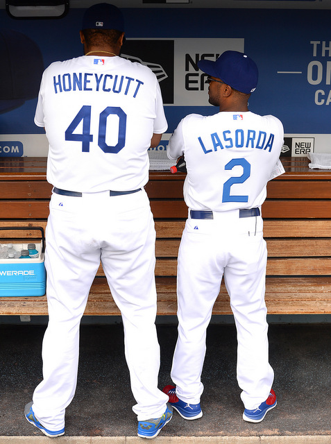 Guest manager Jimmy Rollins stuffs his belly to look like Tommy Lasorda 
