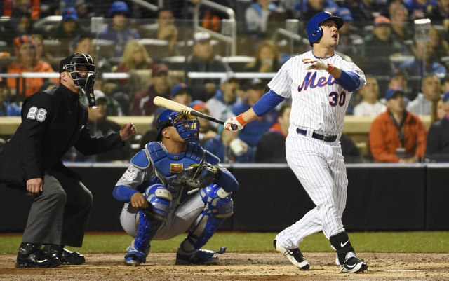 Michael Conforto opened the scoring with a solo homer in Game 4.