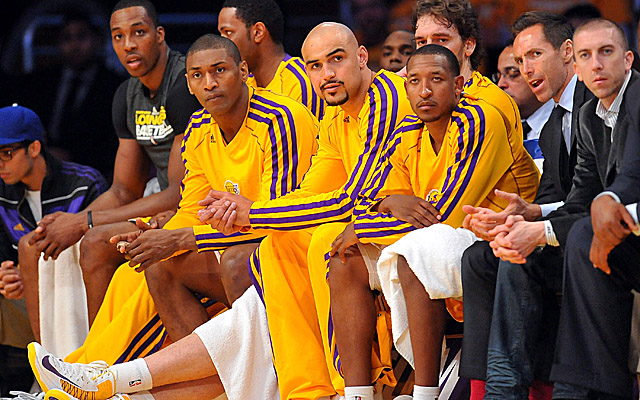 World Peace (second from left) played just 17 minutes in the Lakers' Game 3 loss to the Spurs. (USATSI)