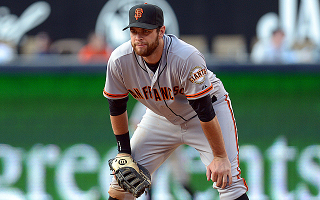 A back injury forced Brandon Belt from Sunday's game.