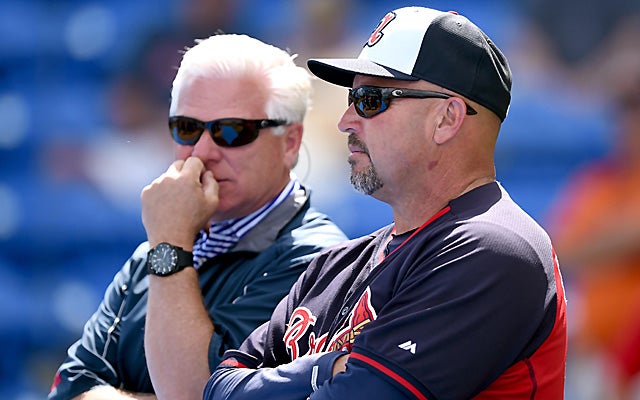 Frank Wren, left, has been relieved of his duties by the Braves. 