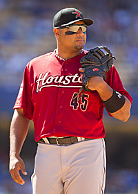 MAY 16 2012: Houston Astros first baseman Carlos Lee #45 stops at