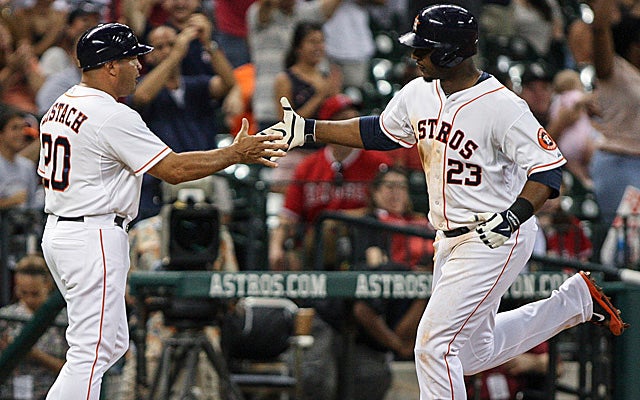 A familiar sight: Chris Carter being congratulated for a homer.