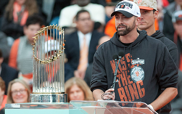 Jeremy Affeldt, with one of the Giants' three World Series trophies.
