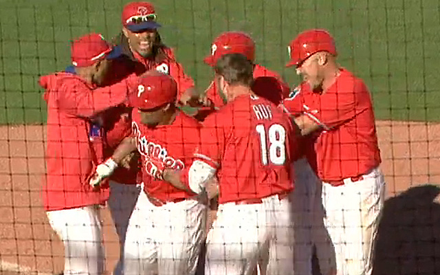 Cedric Hunter, lower left, is congratulated for his walk-off homer.