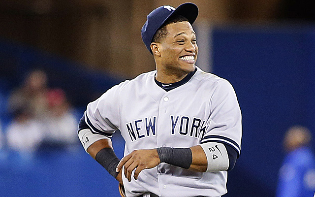 Now Batting (2nd) for the Yankees, Number 24, Robinson Cano