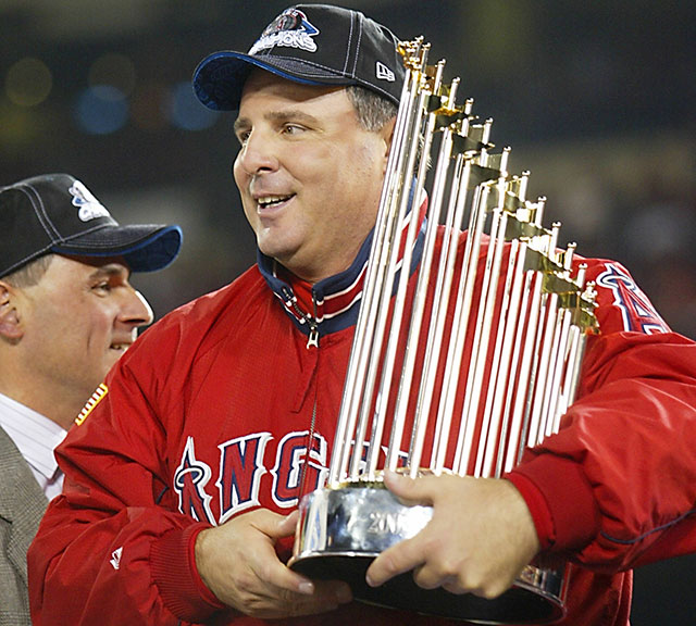 Troy Glaus of the Anaheim Angels holds up the World Series trophy News  Photo - Getty Images