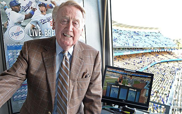 Vin Scully will again man the Dodgers broadcasting booth in 2015.