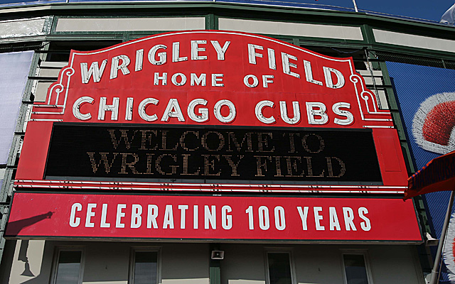 Fans gather in front of Wrigley Field before the ballpark's 100th