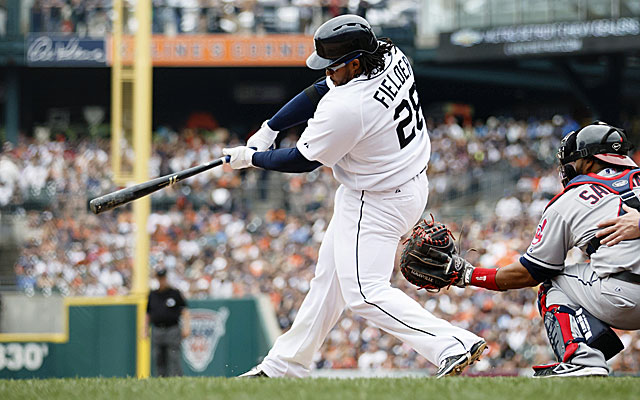 Prince Fielder works out by squatting with teammates on his back