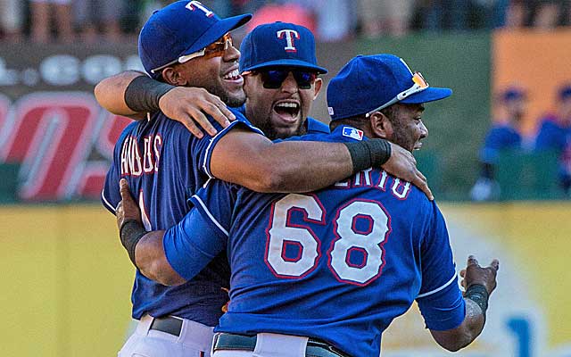 Rangers celebrate after beating the Angels to clinch the AL West title on Sunday. (USATSI)
