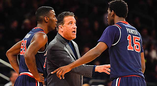 Steve Lavin talks to Red Storm mainstays Sir'Dominic Pointer and Rysheed Jordan. (Getty Images)