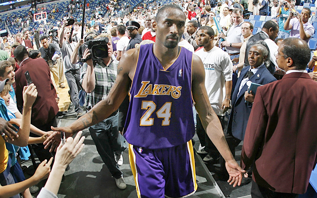 Kobe walks off the court following the Hornets game after his fourth straight 50-point game. (Getty Images)