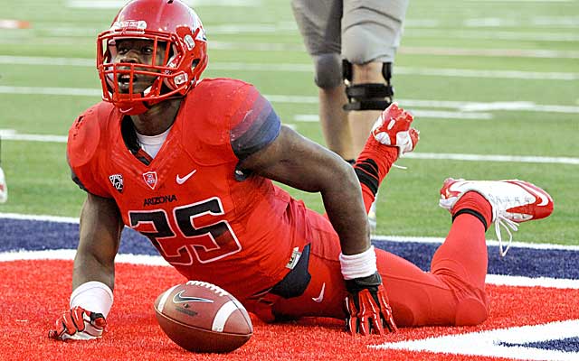 Ka'Deem Carey scores a fourth-quarter TD in a romp over Oregon.  (USATSI)