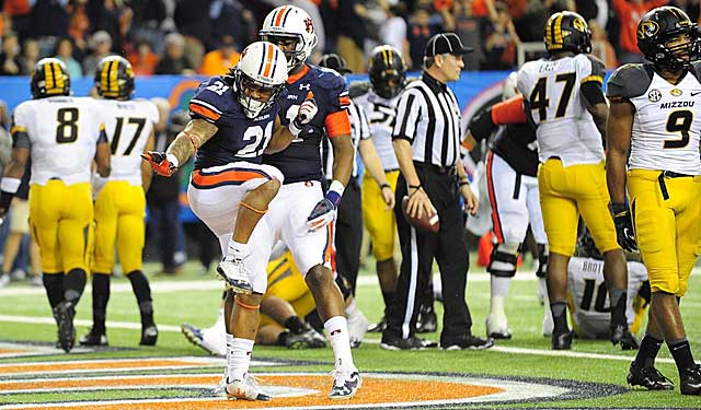 Tre Mason finds time to make a statement move during his statement SEC title game. (USATSI)