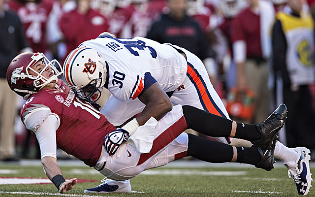 Auburn defensive end Dee Ford made life tough for SEC quarterbacks in 2013. (Getty)