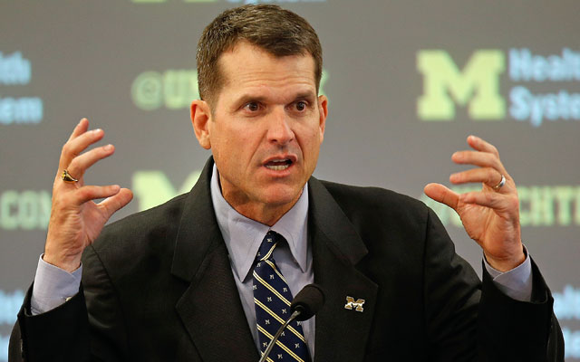 Michigan coach Jim Harbaugh has experienced success at every career stop. (Getty)