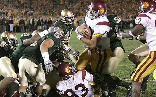 Matt Leinart found his way across the plane with a little help. (Getty Images)