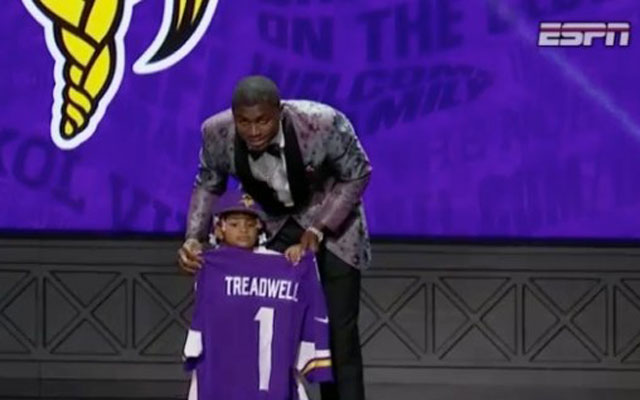 Laquon Treadwell and his daughter show off his new Vikings jersey. (ESPN)