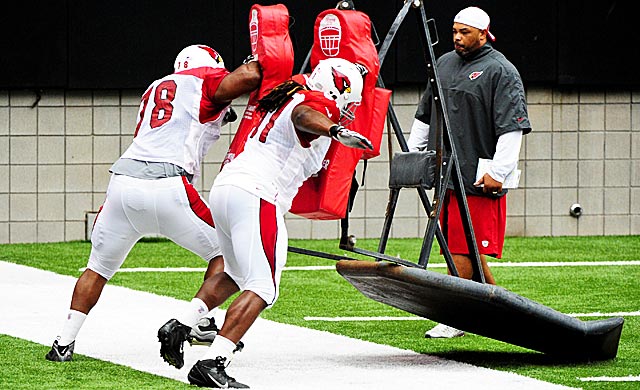 The Cardinals hope Jonathan Cooper (61) can make a big difference on their problematic O-line. (USATSI)