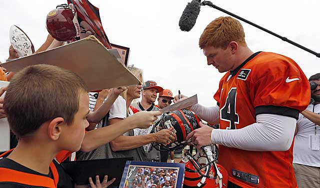 Andy Dalton signs autographs at camp. Is he good enough to do this at a Super Bowl? (USATSI)