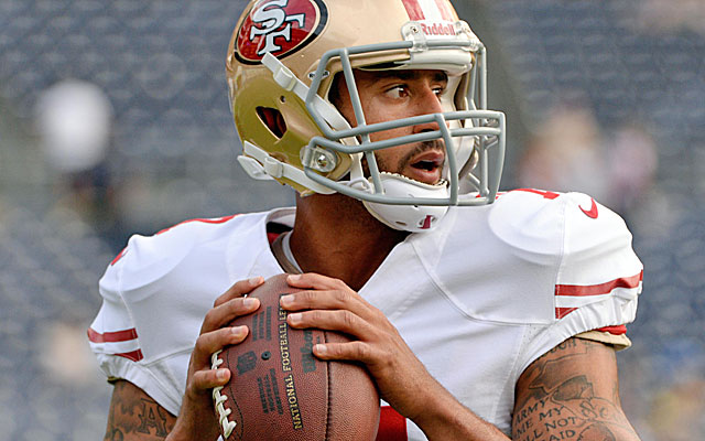 Defensive coordinators have spent the offseason scheming to slow down read-option QBs like Colin Kaepernick. (USATSI)