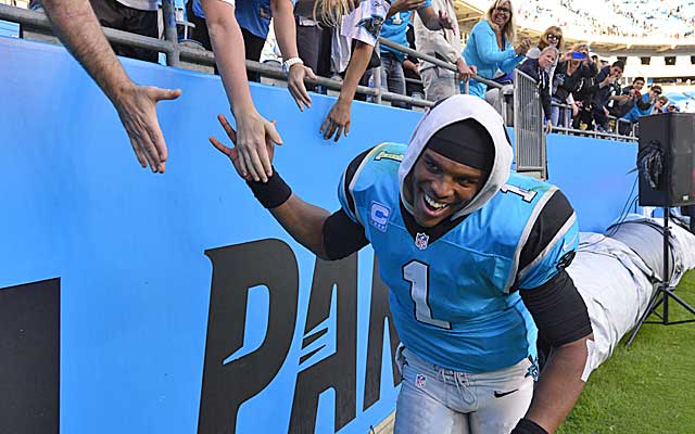 Cam Newton celebrates after leading the Panthers to their fourth win in a row.  (USATSI)