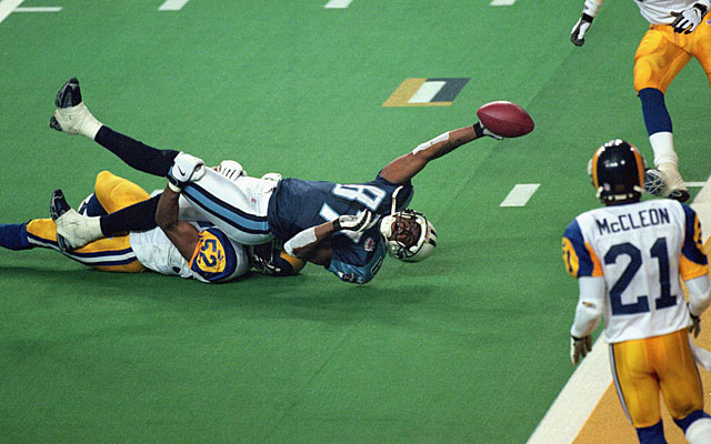 Mike Jones held onto Kevin Dyson, keeping the Titans a yard short of the tying touchdown. (Getty Images)