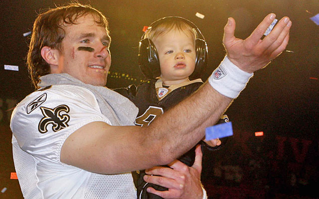 Drew Brees famously celebrated with his son after leading the Saints to their first NFL title. (USATSI)