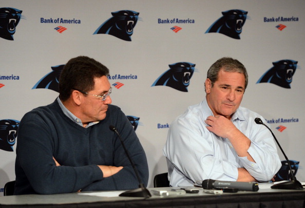 Gettleman (right) with coach Ron Rivera in January after an impressive season. (Getty Images)