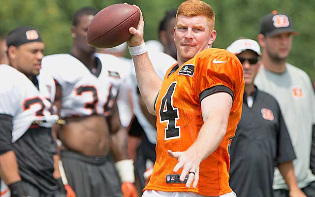 Andy Dalton of the Cincinnati Bengals attempts to break a tackle