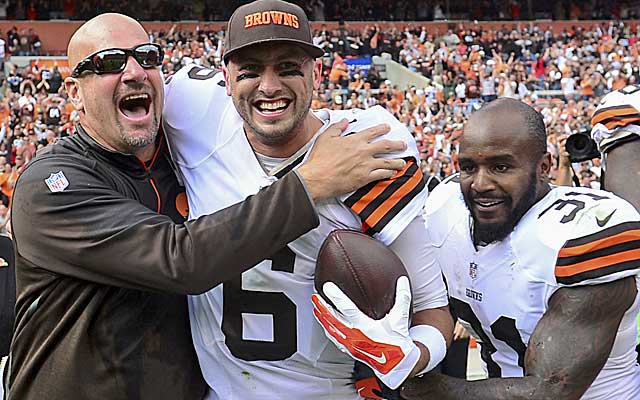 Mike Pettine and Brian Hoyer celebrate a big win over the Saints. (USATSI)
