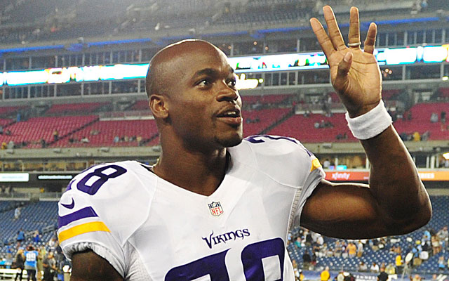 Adrian Peterson has been suspended from all Vikings activities since his indictment.  (USATSI)