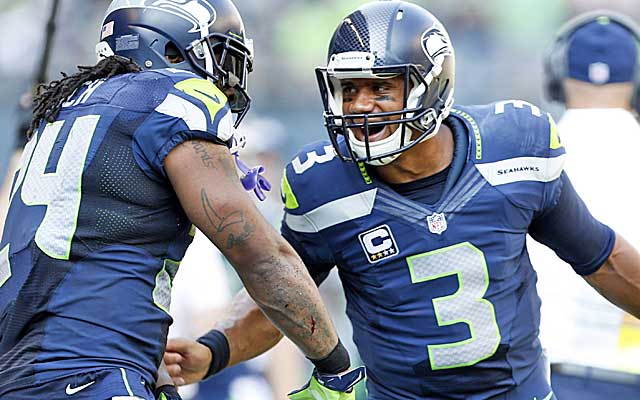 Russell Wilson and Marshawn Lynch make sure the Broncos offense never sees the ball in OT. (USATSI)
