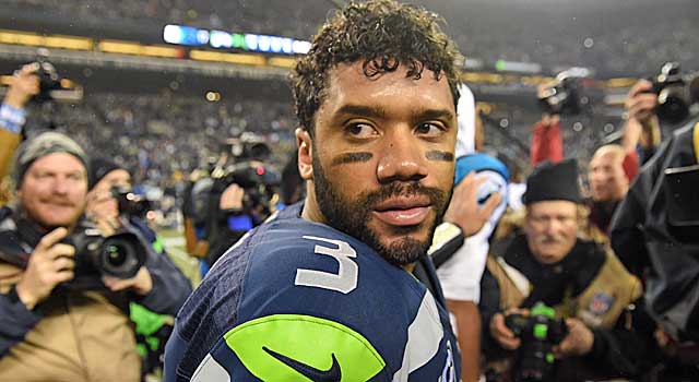 With one more win, Seahawks QB Russell Wilson enters $20M-a-year territory. (Getty Images)