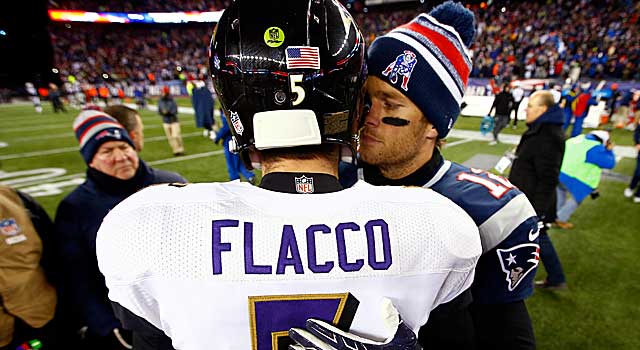 Tom Brady and Joe Flacco talk after the Patriots eliminate the Ravens. (Getty Images)