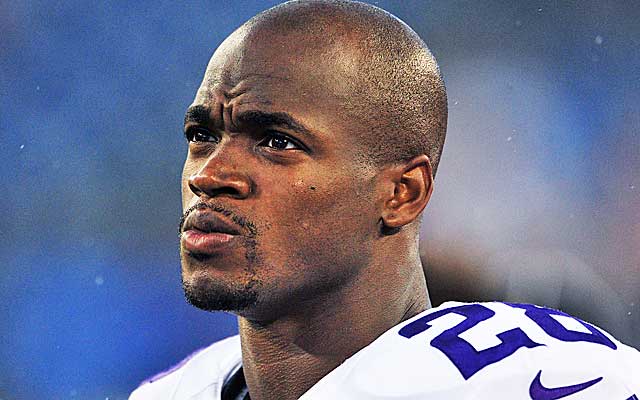 The Vikings want Adrian Peterson back, but at what price?  (Getty Images)
